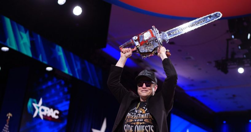 CEO of Tesla and SpaceX Elon Musk leaves the stage holding a chainsaw after speaking at the Conservative Political Action Conference (CPAC) at the Gaylord National Resort Hotel And Convention Center on February 20, 2025 in Oxon Hill, Maryland.