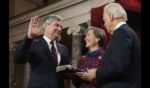 U.S. Sen. Sheldon Whitehouse (D-RI) (L) participates in a reenacted swearing-in with his wife Sandra Thornton Whitehouse and U.S. Vice President Joe Biden in the Old Senate Chamber at the U.S. Capitol January 3, 2013 in Washington, DC.