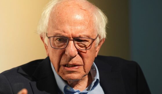 Sen. Bernie Sanders chats with a reporter before speaking during a stop of the "Fighting Oligarchy" tour in Denver, Colorado, on Friday.