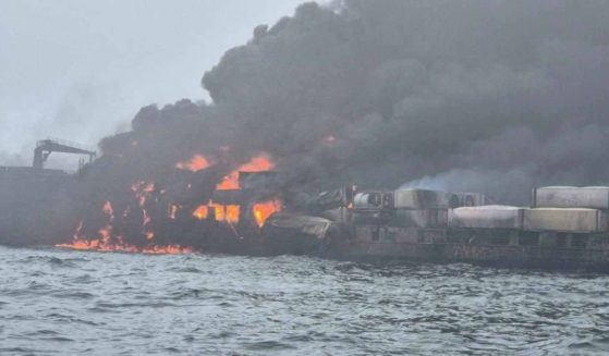 A search and rescue mission is underway, after an oil tanker and cargo vessel collided off the coast of England on Monday, setting both ships ablaze.