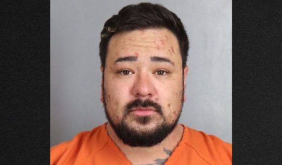 Colorado resident Brandon Vigil, 32, was arrested on 51 criminal charges connected with his alleged treatment of children at a day care facility, according to the Arapahoe County Sheriff's Office.