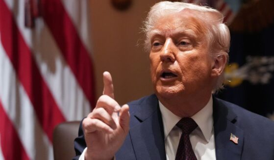 President Donald Trump calls on a reporter to ask a question during a cabinet meeting at the White House in Washington, D.C., on Monday.