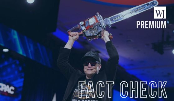 Tesla CEO and Department of Government Efficiency chief Elon Musk holds a chainsaw at the Feb. 20 Conservative Political Action Conference in Oxon Hill, Maryland