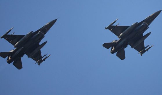 The F-16 169th Fighter Wing performs a flyover during pre-race ceremonies prior to the NASCAR Cup Series Cook Out Southern 500 in Arlington, South Carolina, on Sept. 3, 2023.