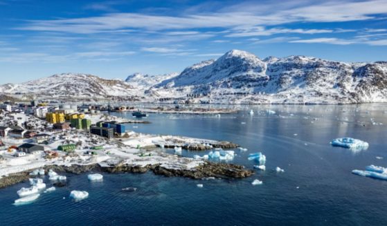 This aerial view shows icebergs floating in the waters off the shore of Nuuk, Greenland, on Tuesday.