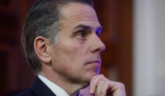 Hunter Biden listens as then-President Joe Biden speaks during a Hanukkah reception in the East Room of the White House in Washington, D.C., on Dec. 16.