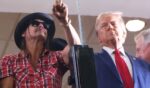 Kid Rock, left, has convinced President Donald Trump -- seen in a September photo during his 2024 campaign -- to agree to a meeting with liberal TV host Bill Maher.