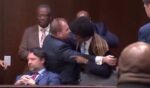 Tennessee Democratic State Rep. Justin Pearson appears to lunge at a colleague as a committee considers legislation on gun policy.