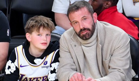 Ben Affleck, right, and Samuel Garner Affleck, left, attend a basketball game between the Los Angeles Lakers and the Golden State Warriors in Los Angeles, California, on Feb. 6.