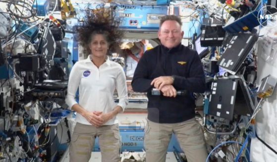 NASA astronauts Suni Williams, left, and Butch Wilmore, right, participate in a news conference from the International Space Station on Sept. 13.