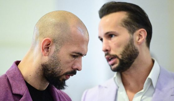 Andrew Tate, left, and Tristan Tate, right, are pictured inside The Court of Appeal in Bucharest, Romania, on Dec. 10.