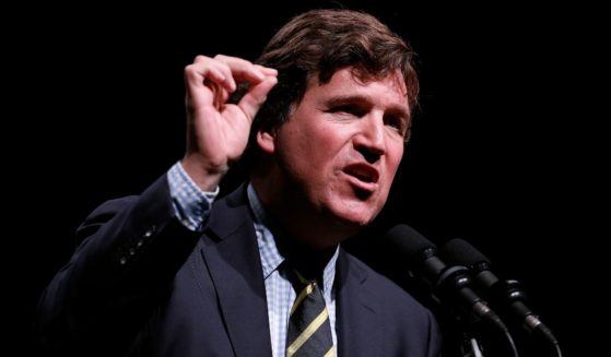 Tucker Carlson speaks at his Live Tour at the Desert Diamond Arena in Phoenix, Arizona, on Oct. 31.