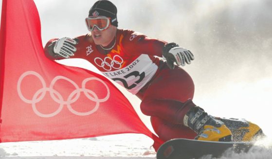 Ryan Wedding of Canada competes in the qualifying round of the men's parallel Giant Slalom snowboarding event on Feb. 14, 2002, during the Salt Lake City Winter Olympic Games at the Park City Mountain Resort in Park City, Utah.