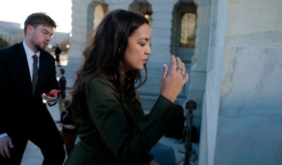 U.S. Rep. Alexandria Ocasio Cortez (D-NY) speaks to reporters during a series of votes at the Capitol on March 11, 2025 in Washington, DC.