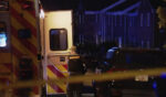 Law enforcement responds to a deadly shooting at a town house complex in Spotsylvania County, Virginia, on Tuesday.
