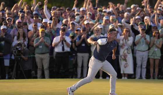 Rory McIlroy reacts after winning in a playoff against Justin Rose after the final round at the Masters golf tournament in Augusta, Georgia, on Sunday.