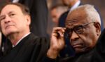 U.S. Supreme Court Justices Samuel Alito, left, and Clarence Thomas, seen at President Donald Trump's Jan. 20 inauguration, dissented from Saturday's Supreme Court ruling.