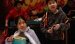 Children visit a movie theatre to watch the animated film Nezha 2 in Beijing on Feb. 16, 2025.