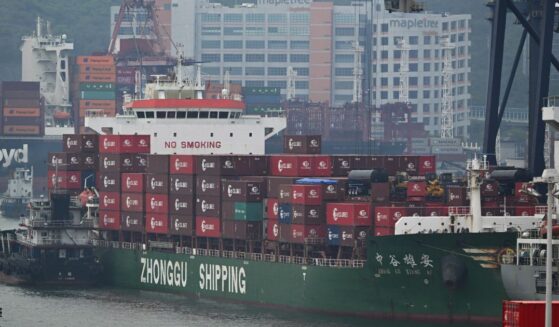 A cargo ship is seen at the Kwai Chung container terminal in Hong Kong on Tuesday.