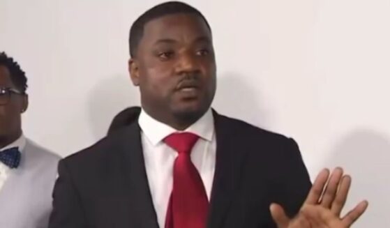 Dominque Alexander, an activist who has linked himself to the Karmelo Anthony case, began Thursday's news conference by attacking the father of murder victim Austin Metcalf after having him removed.