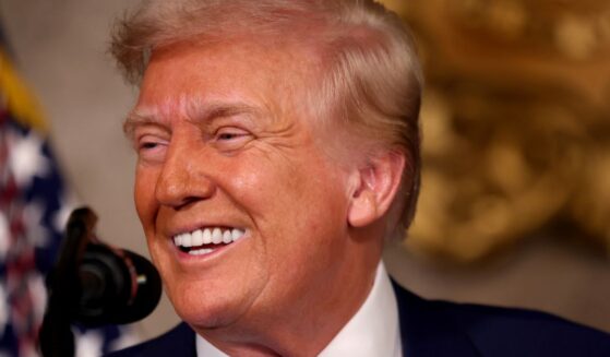 President Donald Trump delivers remarks after signing an executive order at his Mar-a-Lago resort in Palm Beach, Florida, on Feb. 18.