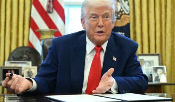 President Donald Trump speaks before signing an executive order in the Oval Office of the White House in Washington, D.C., on Wednesday.