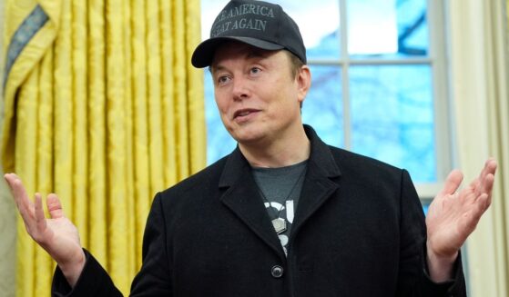 Elon Musk speaks during an event with President Donald Trump in the Oval Office at the White House in Washington, D.C., on Feb. 11.