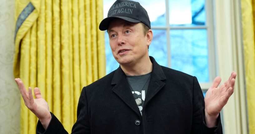 Elon Musk speaks during an event with President Donald Trump in the Oval Office at the White House in Washington, D.C., on Feb. 11.
