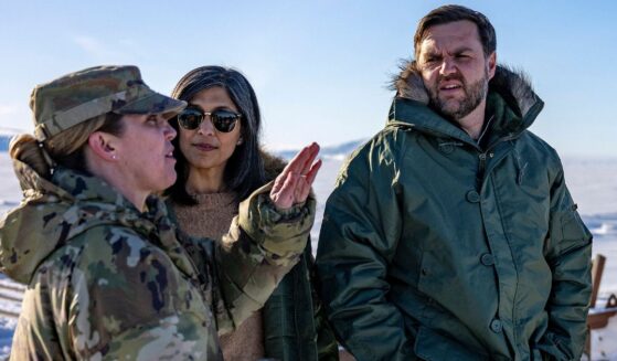 Vice President J.D. Vance, right, and second lady Usha Vance, center, listen to Col. Susan Meyers, left, as they tour Pituffik Space Base in Greenland on March 28.