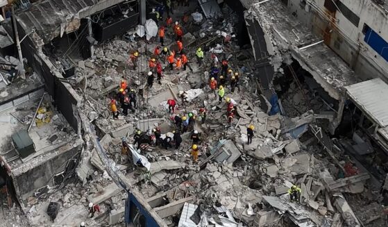 Rescue teams work at the Jet Set nightclub a day after the collapse of its roof in Santo Domingo on Wednesday.