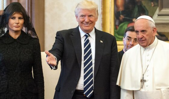 Pope Francis, right, is pictured meeting President Donald Trump, center, and First Lady Melania Trump at the Apostolic Palace on May 24, 2017, in Vatican City. Trump announced he and the first lady will attend Pope Francis' funeral this week.