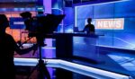 A TV news studio prepares to go live.