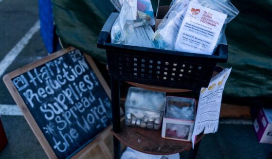 Early in the morning Harm Reduction Supplies for safer drug use are put out within an Urban Alchemy tent village for the homeless a block from San Francisco's City Hall in the Tenderloin neighborhood of San Francisco, California, on Jan. 26, 2022.