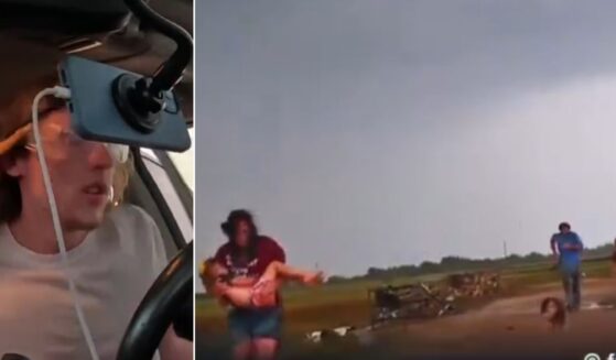 Storm chaser Freddy McKinney, left, encountered the family just after the tornado hit.