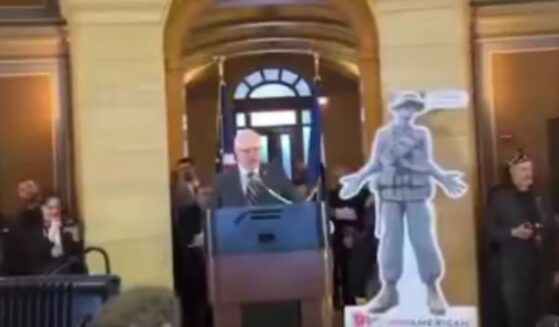 While giving a speech in Minnesota on Wednesday, Gov. Tim Walz was heckled by veterans over his stolen valor.