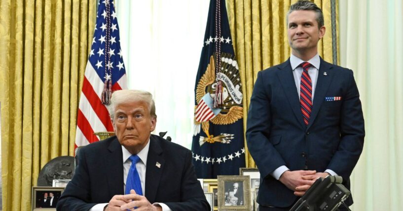 President Donald Trump, left, and Defense Secretary Pete Hegseth, right, participate during an event in the Oval Office of the White House in Washington, D.C., on March 21.