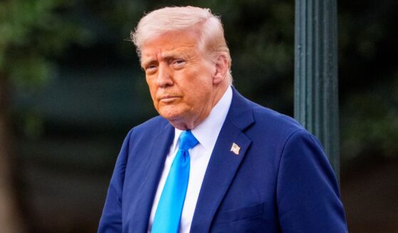 President Donald Trump walks toward Marine One on the South Lawn of the White House in a photo taken Friday.