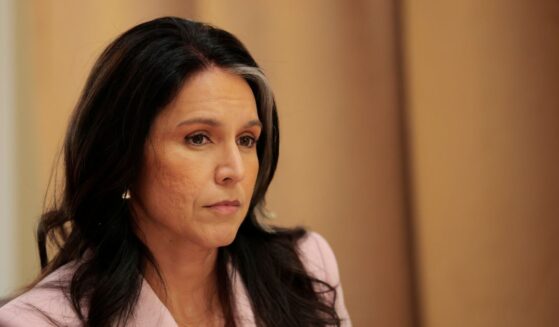 Director of National Intelligence Tulsi Gabbard listens during a Cabinet meeting at the White House on April 10, 2025, in Washington, D.C.