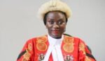 A United Nations judge and former Columbia University human rights fellow was convicted last month in the U.K. of forcing an African woman to work as a slave.