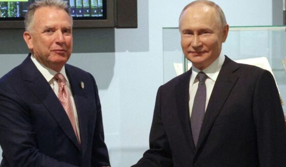 Russian President Vladimir Putin, right, and President Donald Trump's special envoy Steve Witkoff, left, shake hands prior to their talks in St. Petersburg, Russia, on Friday.